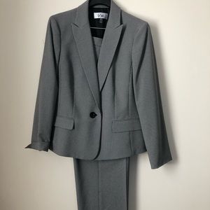 Le suit size 14